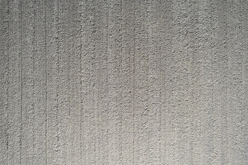 Freshly plowed arable land directly from above. Brown background with structural. Pattern.