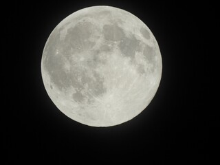 Full moon isolated in the black background. © Md188/Wirestock Creators