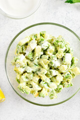 Avocado eggs salad in bowl