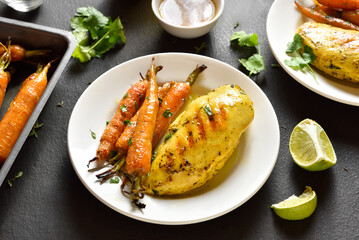 Roasted chicken breast with carrots
