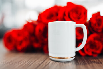 Flowers and cup of tea close up