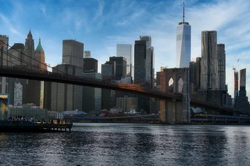Fotobehang Cityscape of Manhattan and the famous Brooklyn bridge © Sardor Grey/Wirestock Creators