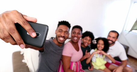 African family taking selfie photo with smartphone