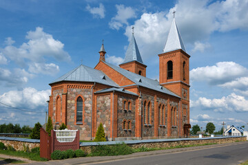 Fototapeta na wymiar Old ancient catholic church of St Simeon and Tadeusz in Lazduny village, Grodno region, Belarus.