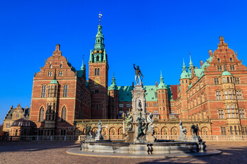 Obraz premium Neptune Fountain in a front of Frederiksborg castle in Hillerod, Denmark