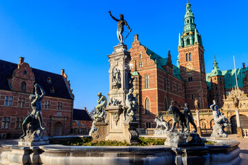 Naklejka premium Neptune Fountain in a front of Frederiksborg castle in Hillerod, Denmark