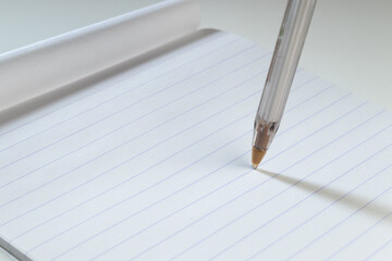 Ballpoint pen nib on paper mockup, hard light