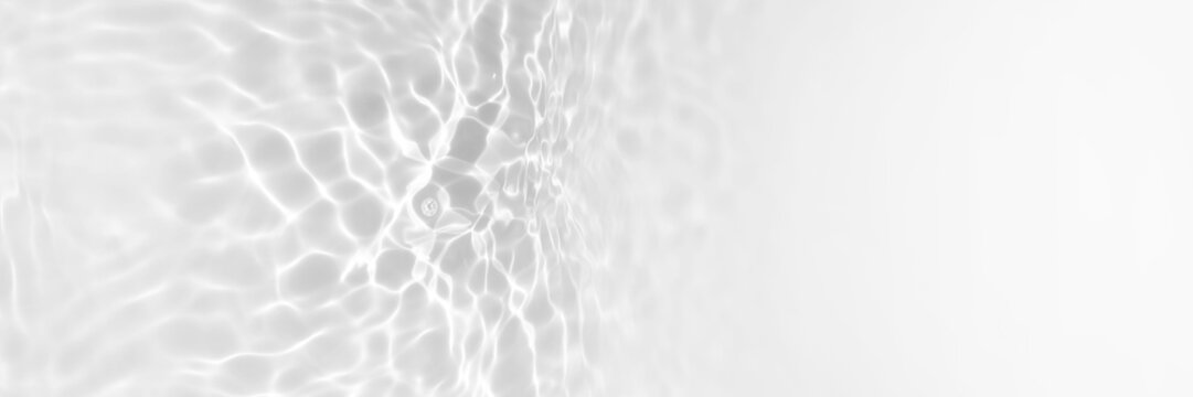 Water texture with sun reflections on the water overlay effect for photo or mockup. Organic light gray drop shadow caustic effect with wave refraction of light. Long Banner with copy space