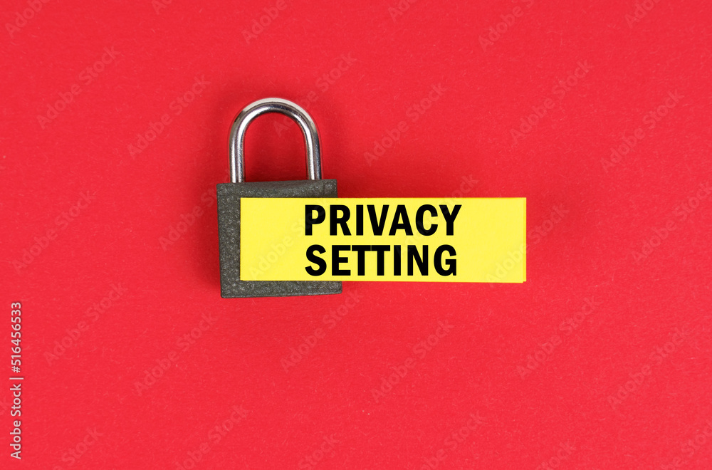 Poster On the red surface there is a lock with a sticker with the inscription - PRIVACY SETTING