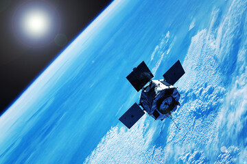 Space satellite, above the Earth. Elements of this image furnished by NASA