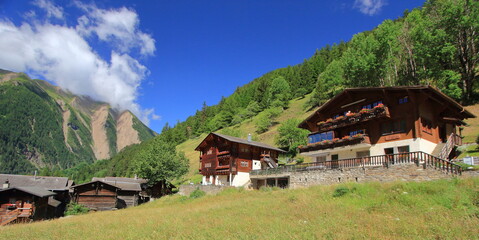 Obraz premium Traditional wooden swiss houses in the Alps mountain, Binn, Binntal, in the canton of Valais in Switzerland