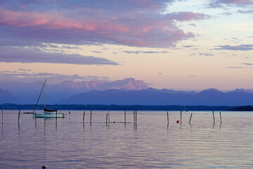 sunset on lake starnberg with the alps in background 2022