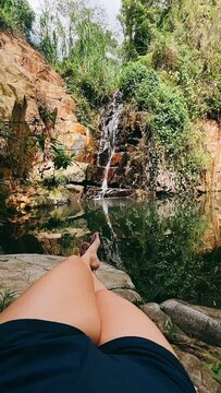 Person relaxing, OUtdoors, Waterfalls, Person laying down Looking at waterfall, Waterfall in the jungle, Puerto Rico, POV, Point of VIew