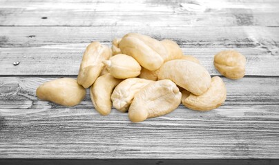 Pile of peeled roasted nuts. Package design element