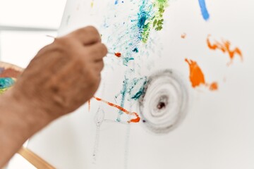 Senior artist man painting at art studio.