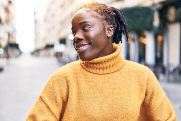 Fototapeta premium African american woman smiling confident standing at street