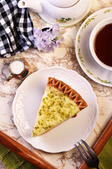 A slice of delicious lemon aloe vera pie served on table  