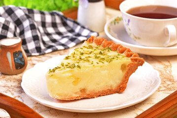 A slice of delicious lemon aloe vera pie served on table  