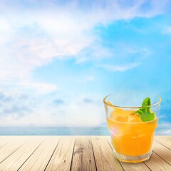 Tasty summer alcoholic cocktails on beach with white sand. Summer sea vacation and travel concept. Exotic summer drinks.