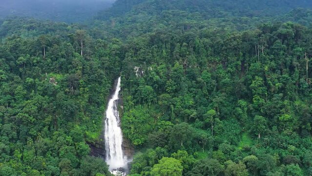 Aerial drone of Waterfall in the tropical forest. Mapalana Falls. Sri Lanka.