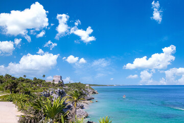 Mexico, Tulum Archaeological Zone and Mayan pyramids on scenic ocean shore.