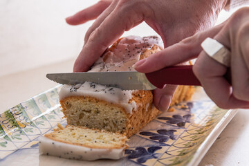 pudding with sugar icing lemon and lime poppy seeds