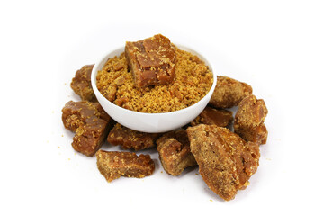 Jaggery Piece  and Jaggery powder isolated on white background