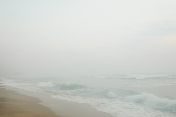 Seascape abstract beach background with misty. sea surf with fog. Image soft look with smooth...