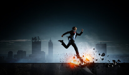 Fototapeta na wymiar Portrait of energetic businessman running