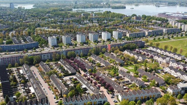 Almere Filmwijk district in a modern suburban city in The Netherlands, province Flevoland. Aerial drone shot.