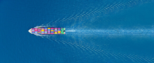 Aerial top view of cargo maritime ship with contrail in the ocean ship carrying container and running for export  concept technology freight shipping sea freight by Express Ship - obrazy, fototapety, plakaty