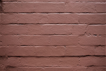 An old painted exterior brick wall.