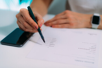 Woman Using Smart Phone Application for Blood Panel List