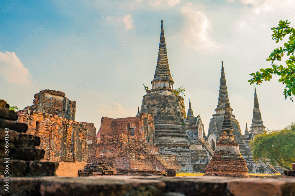 Wall mural Ancient temple in Ayutthaya, Thailand. The temple is on the site of the old Royal Palace of ancient capital of Ayutthaya