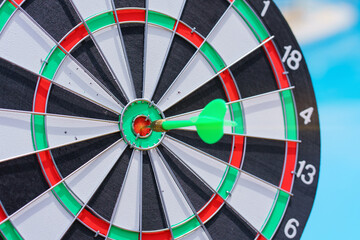 circle target for shooting on dart board aiming, to succes comes after a lot of tries