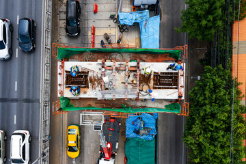 Bangkok urban Mass Transit Project (Pink Line Monorail). Aerial top view Construction of pink line monorail rail transit line in progress.Guide way beam, Light rail transit, construction machinery.