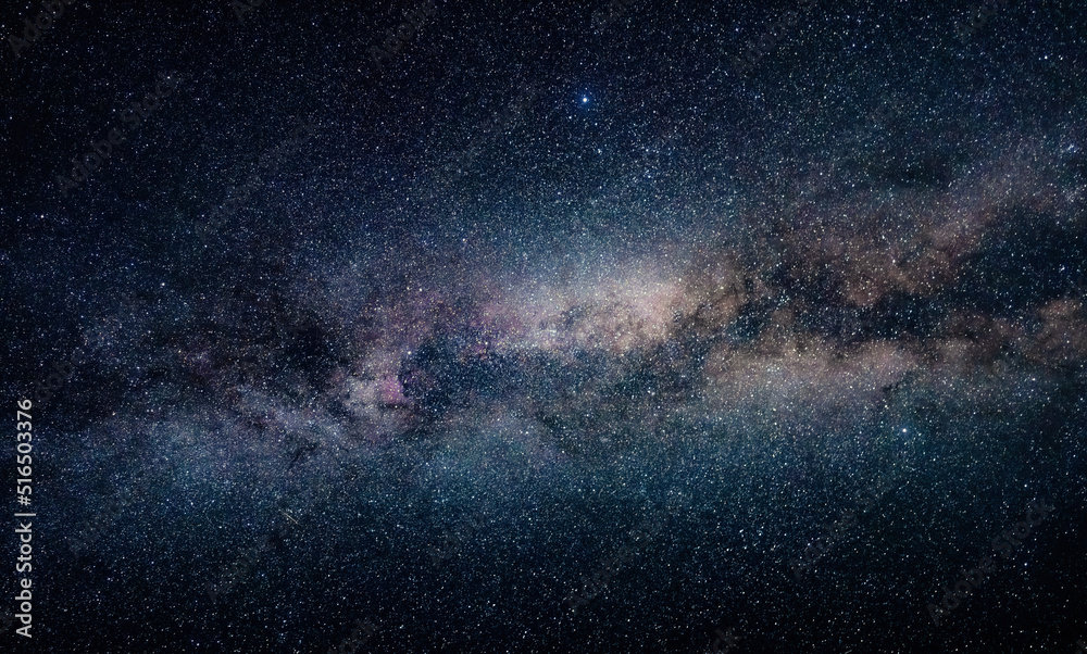 Wall mural milky way in the night sky