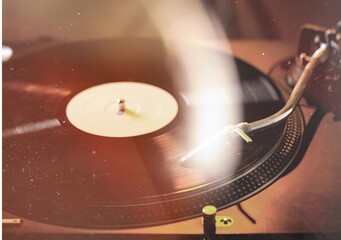 Vinyl record player. Old school style cinemagraph vinyl record player.