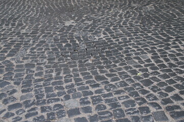 textured background of old cobblestone pavement