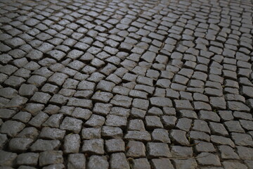 textured background of old cobblestone pavement