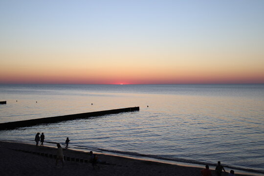 spectacular sunset on the Baltic sea beach	