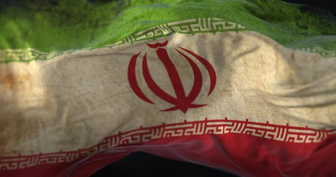 Old Iran Flag waving at wind. Loop