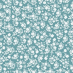 Simple vintage pattern. small  white flowers and leaves. blue  background. Fashionable print for textiles and wallpaper.