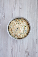 Homemade Caramelized Onion and Spinach Dip, top view. Flat lay, overhead, from above.