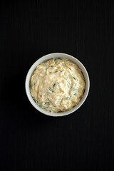 Homemade Caramelized Onion and Spinach Dip, top view. Flat lay, overhead, from above.