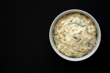 Homemade Caramelized Onion and Spinach Dip, top view. Flat lay, overhead, from above.