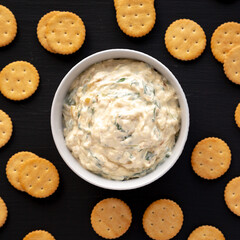 Homemade Caramelized Onion and Spinach Dip, top view. Flat lay, overhead, from above.