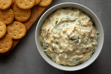 Homemade Caramelized Onion and Spinach Dip, top view. Flat lay, overhead, from above. Close-up.