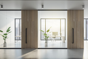 Modern office hallway interior with wooden, concrete and glass elements, window with city view and...
