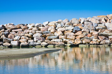 Rock wall protection from the waves - concept image